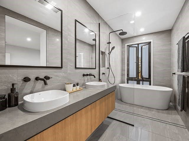 bathroom resprayed to grayish white. Credit: Google